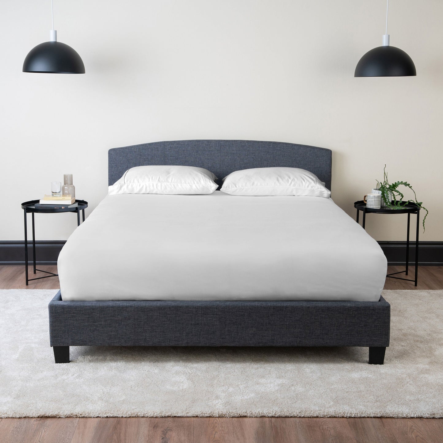 Curvaceous Upholstered Bed Frame with Headboard