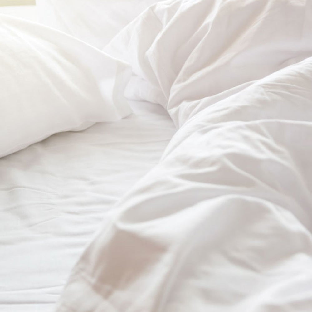 How to Put On a Duvet Cover Without the Fight: Three Methods, and Why Yours Keeps Slipping