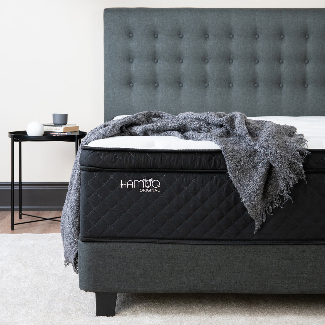 Hamuq Original Hybrid mattress with zoned pocket coil support on a bed frame in a Canadian bedroom